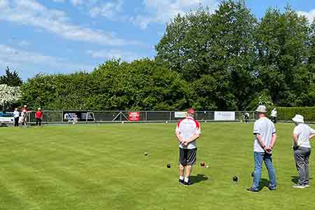 Bowlers being coached on the green